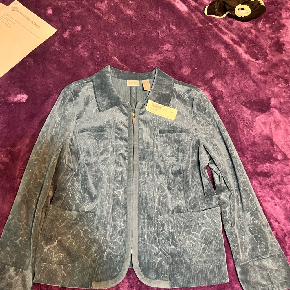 A women’sl new Chico’s jackets with tags in blue corduroy. Women’s size 2.